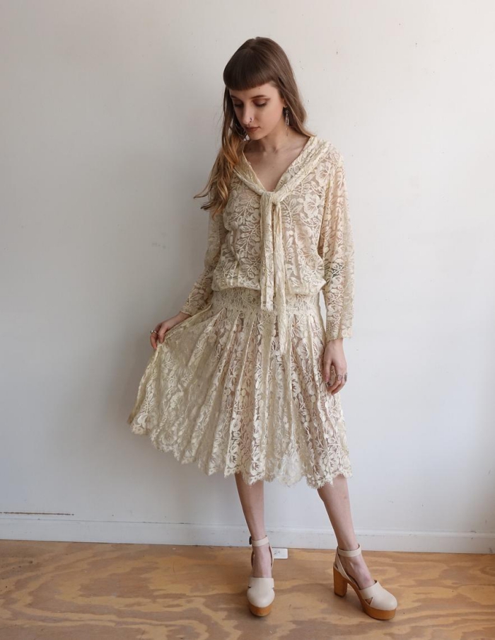 woman in white vintage dress from Lace inspired from the 80s retro fashion