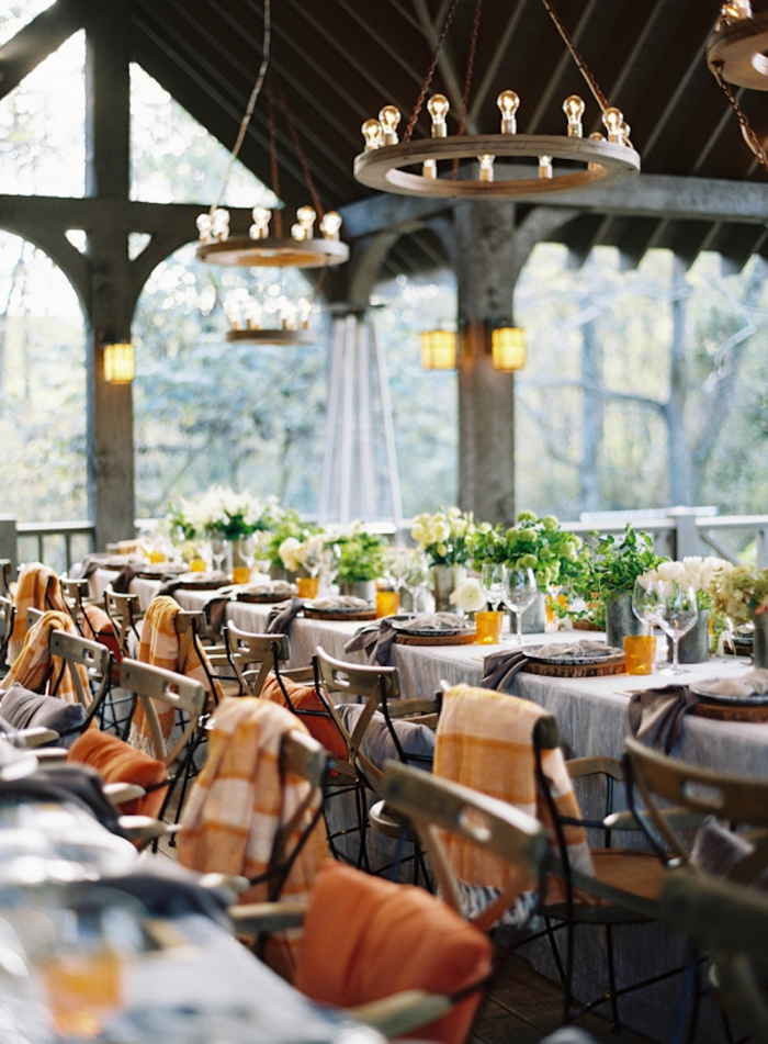 blanket on the back of each chair autumn wedding ideas restaurant porch interior