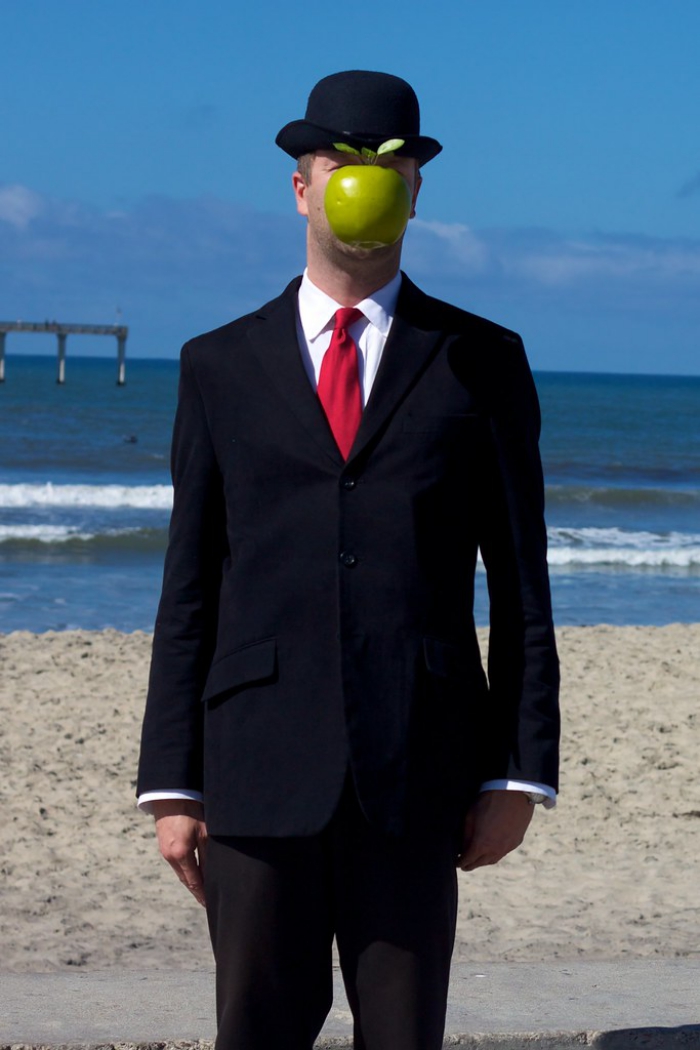  The Son of Man artsy halloween costumes idea man on the beach sea background green apple