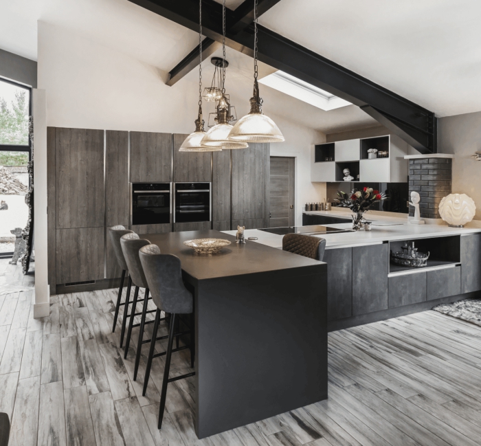 Luxury elegant modern kitchen in dark grey with wooden floor