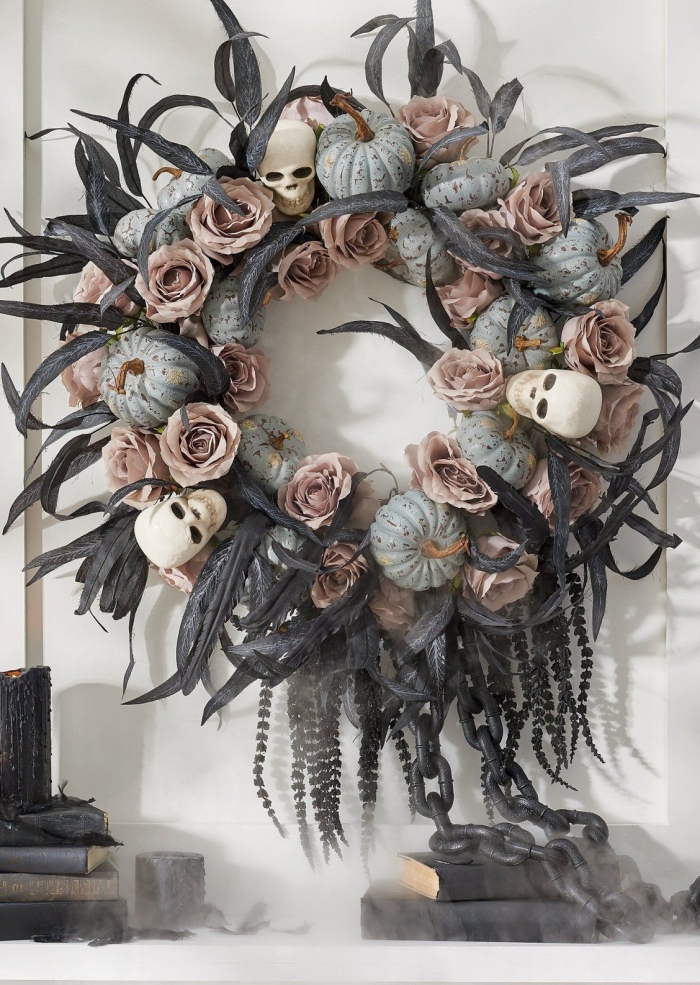 Halloween door wreath with skulls roses pumpkins and feathers