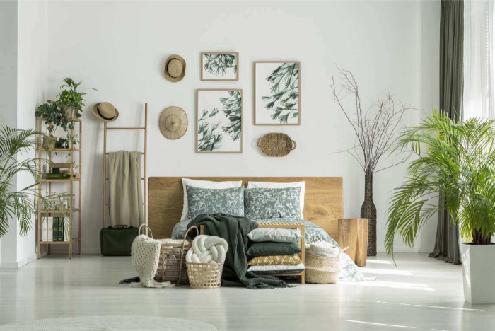 Bedroom with botanical elements wooden furniture and potted plants