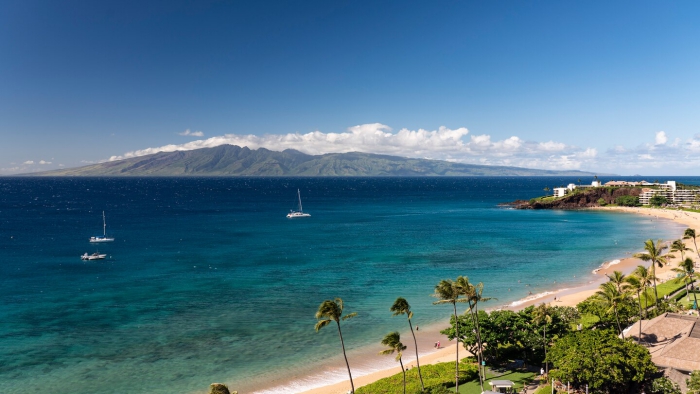 Kaanapali Beach activities in Hawaii sea view with boats palm trees and beach