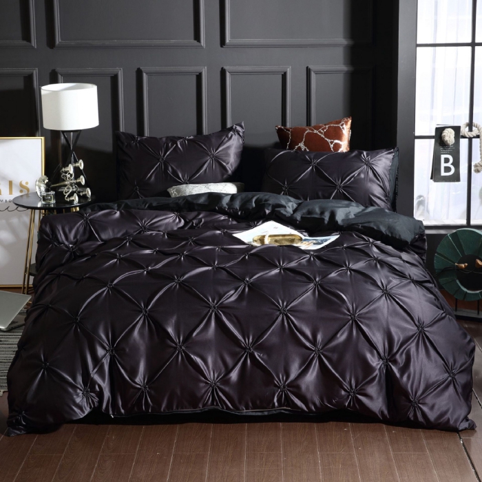 dark bedroom with luxury washed silk duvet cover set in black