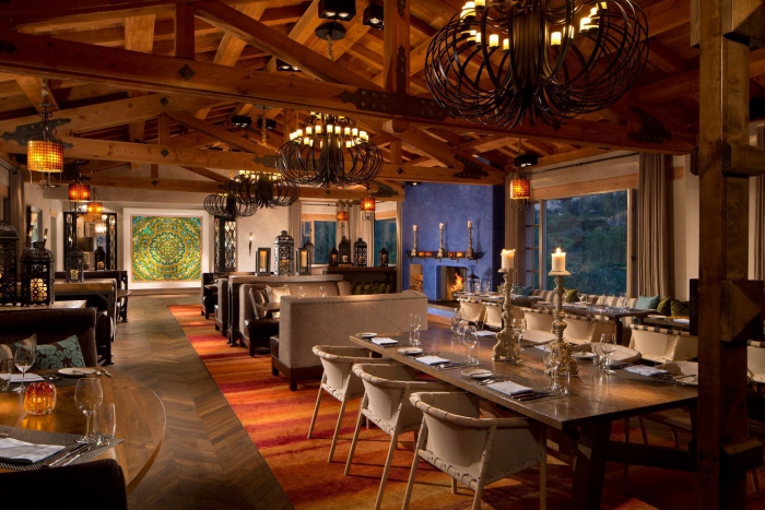 Restaurant interior in Rancho Valencia in California wooden interior chandeliers