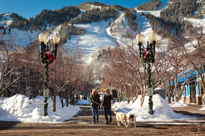 Spending Thanksgiving at St. Regis Resort Colorado snow slopes two women walking dogs