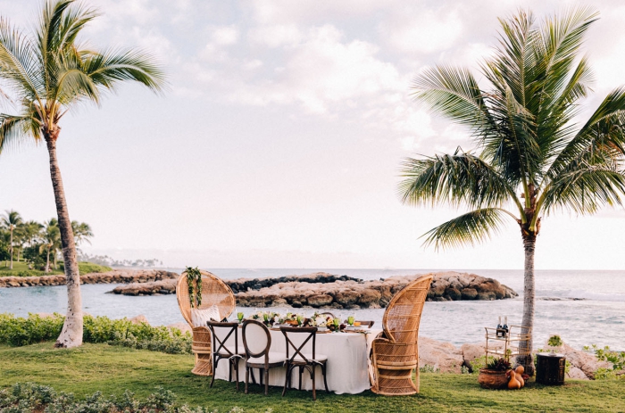 Thanksgiving in Four Seasons Ko Olina in Hawaii seaside lawn with a dinner table and palm trees 