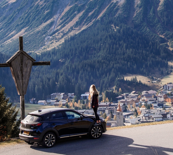 Road trip woman in the mountain on a car