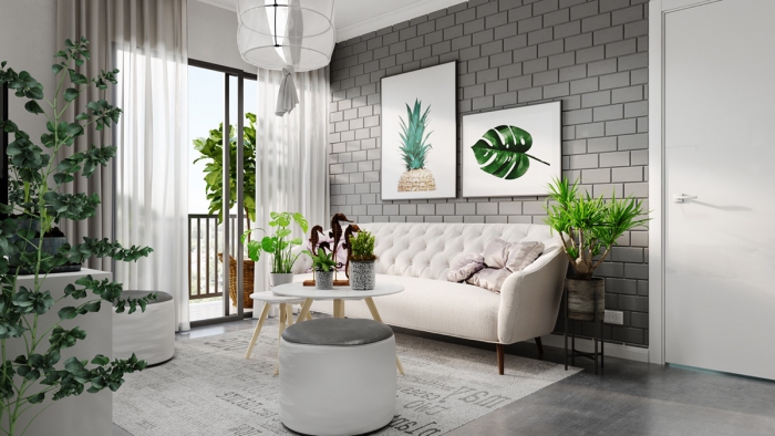 Living room area in white and grey with botanical motifs large window and plants