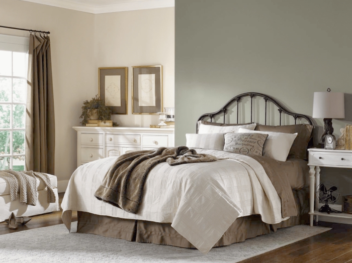 Master bedroom in traditional design style in calming shades of cream, white and grey