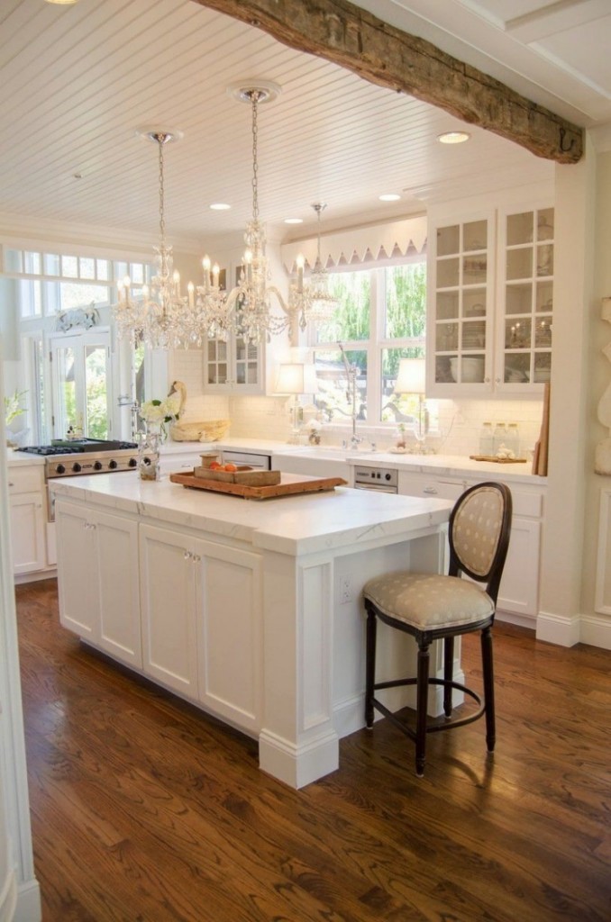 Glamorous kitchen design with vintage vibe and two crystal chandeliers