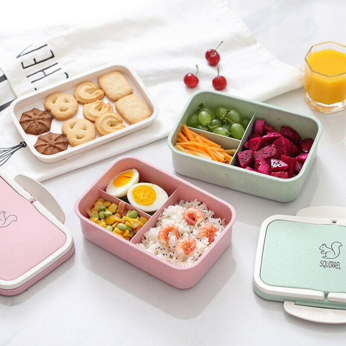 Large Bento Box stackable colorful containers on a white table