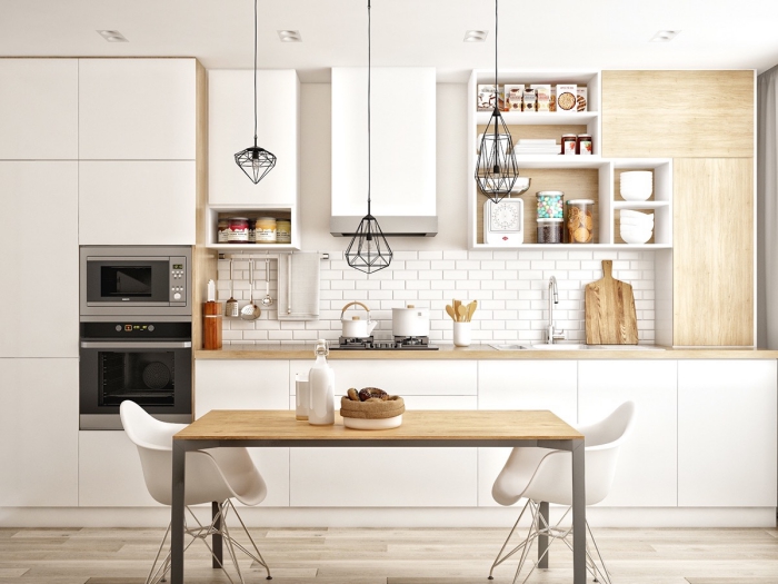 minimalist simple white scandinavian kitchen with wooden table and black metal lighting fixtures