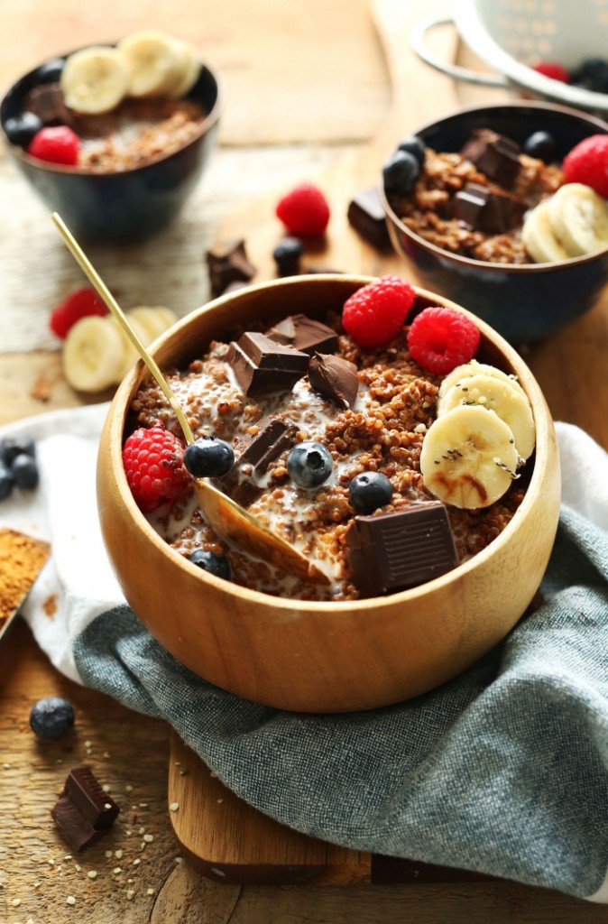 sweet quinoa bowls with fruits pieces of chocolate 