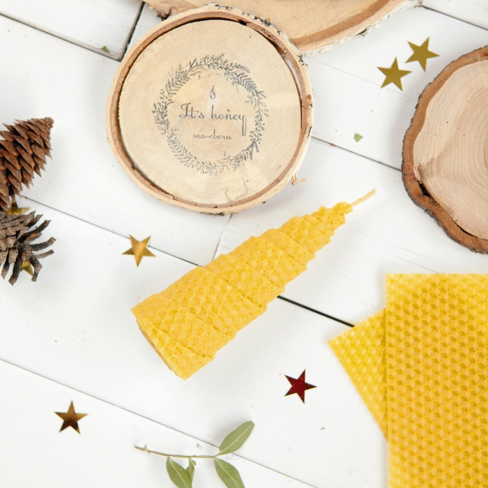 eco-friendly gift ideas beeswax candles on a white table Christmas decor