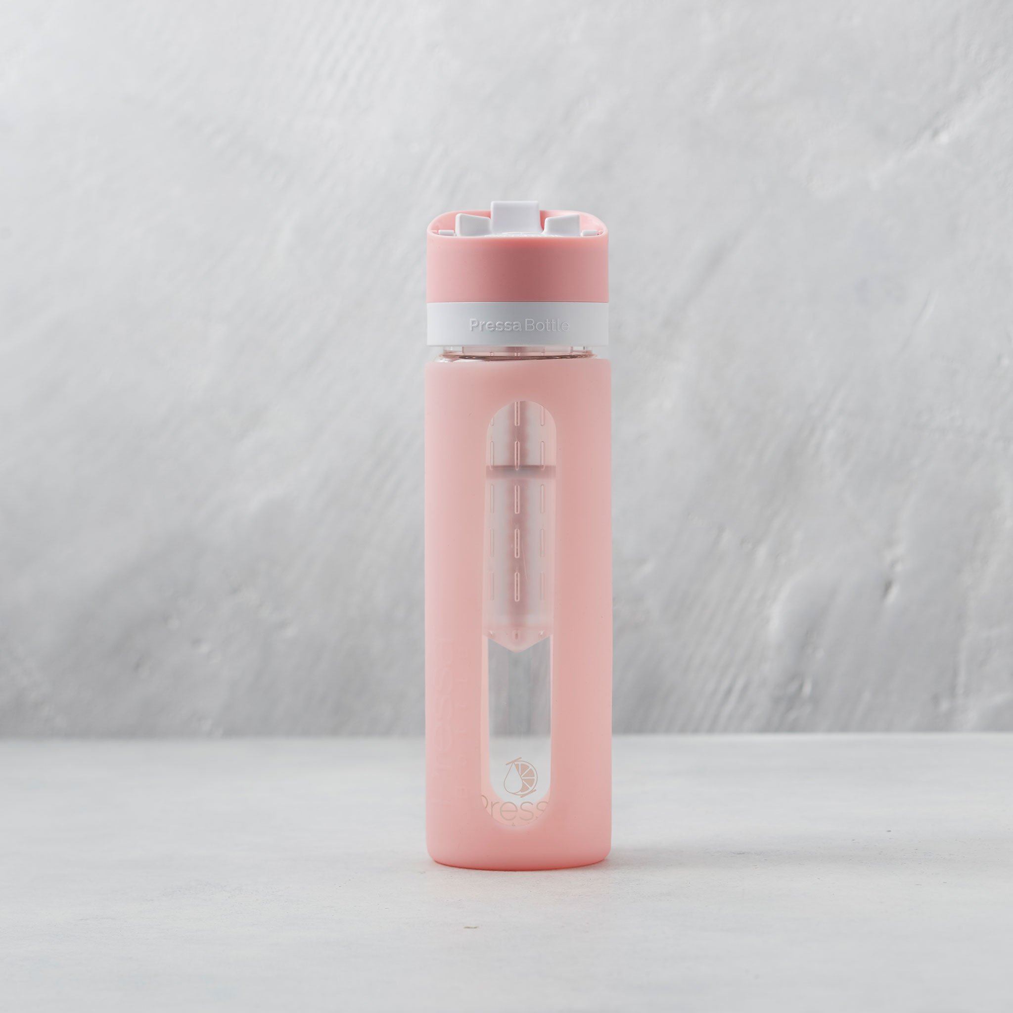 infuser water bottles pink pressa bottle on a white table 
