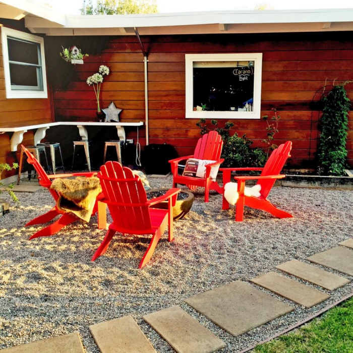 small patio ideas bright red furniture chairs fire pit 