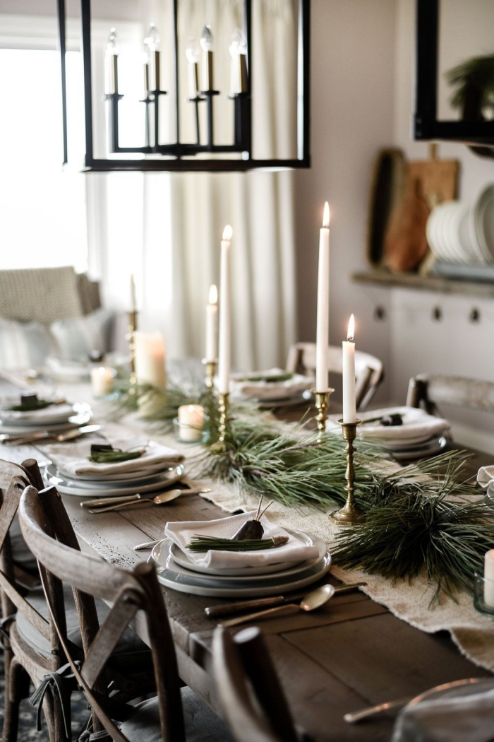 Evergreen table centerpiece candle rustic setting 