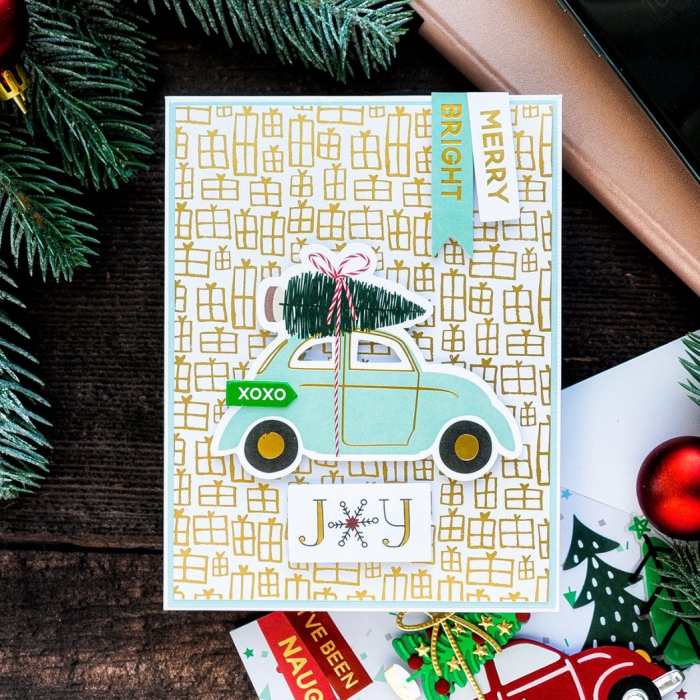 Cute DIY Christmas card with a car and holiday decor