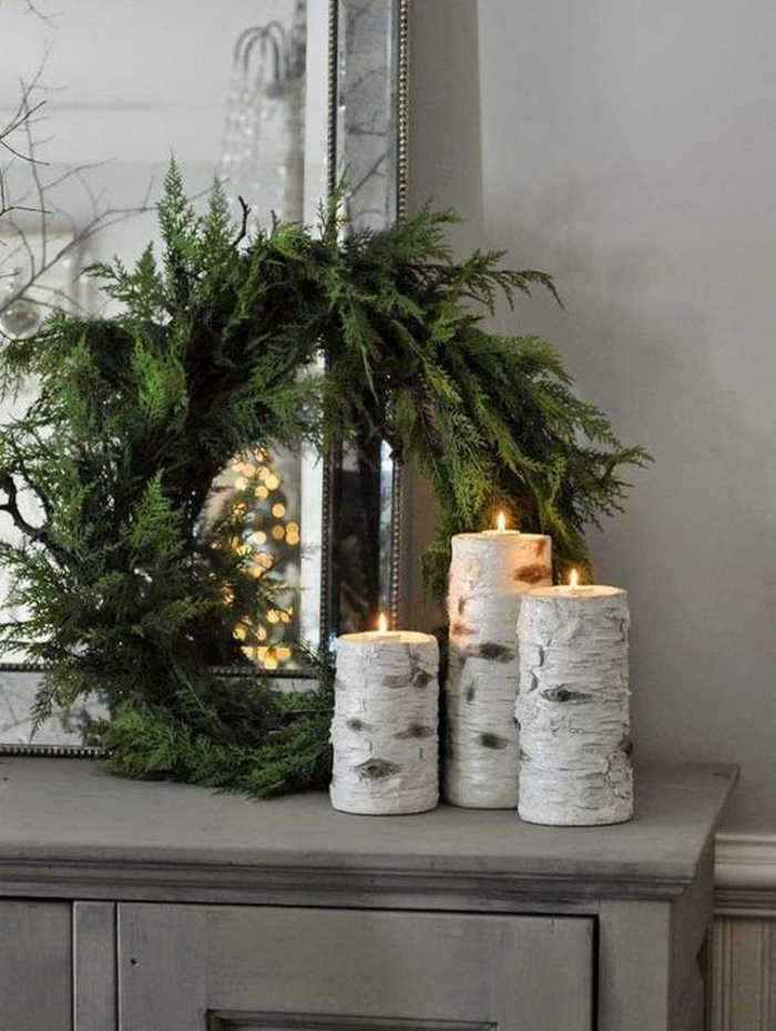 Christmas trends large green wreath natural wood candle holders