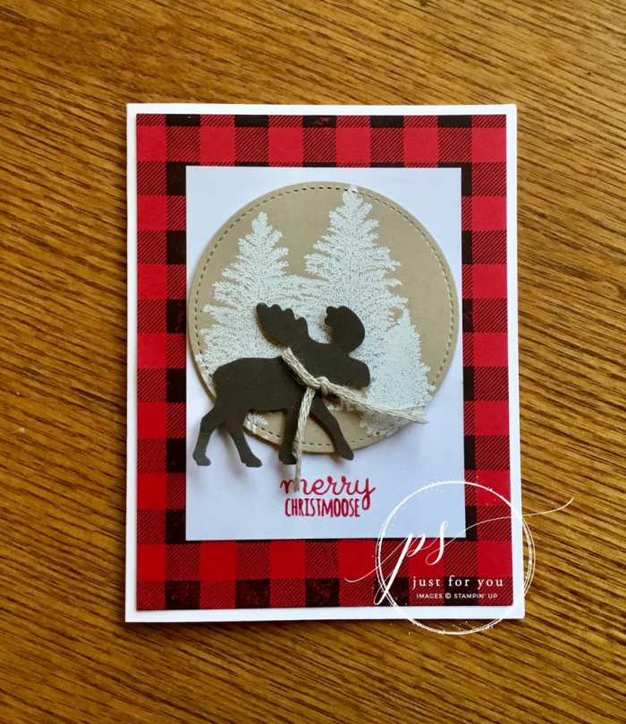 Christmas card with several overlapping patterns and designs reindeer forest checkered background