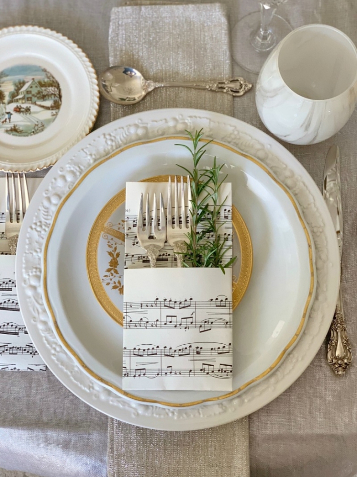 vintage music sheets Christmas table decoration rosemary classic design plates