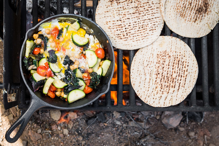 camping food turkey wrap on a fire pan with vegetables