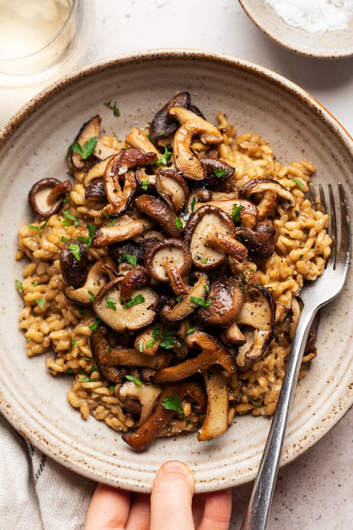 Low Carb Dinners Vegan Risotto with mushrooms on a plate with fork