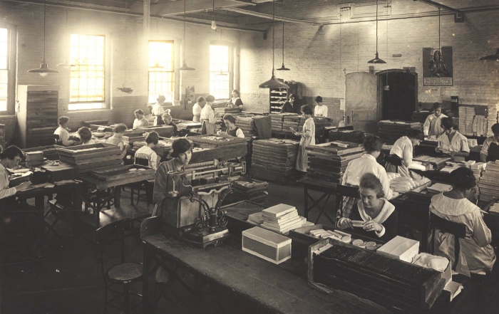 Plastic production in the past factory workers black and white retro photography