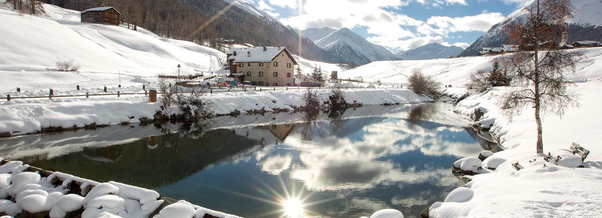 Livigno Best Ski holiday lake snowy landscape winter sun holiday home