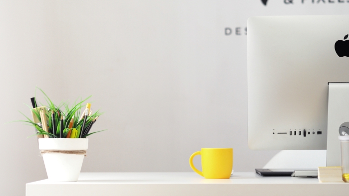 desk white background planter computer yellow cup