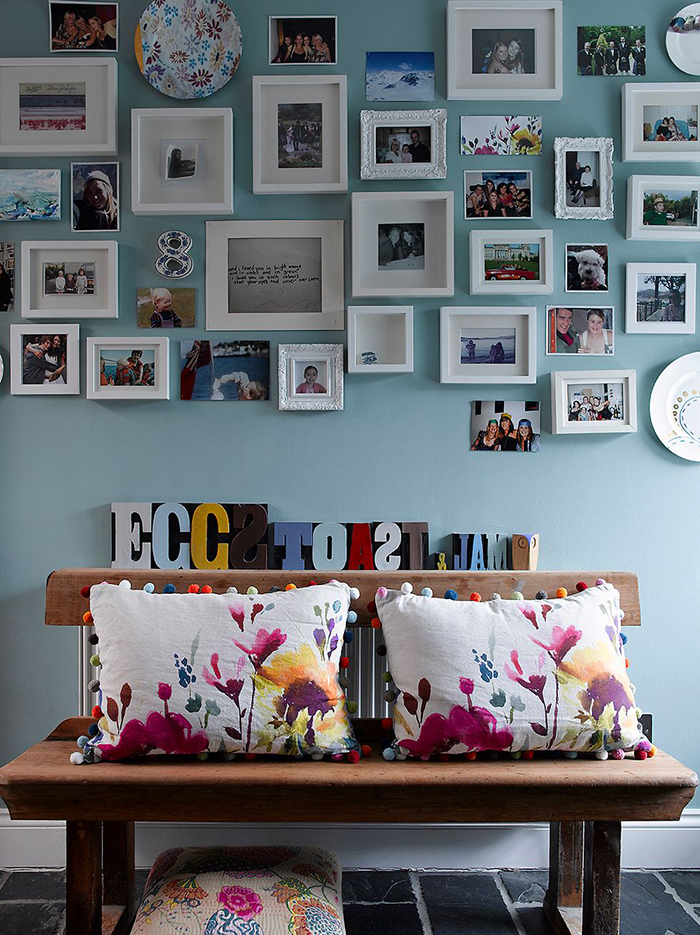 Cool photo wall idea organized chaos small pictures white frames