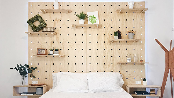 Pegboard bed headpiece idea with shelves 