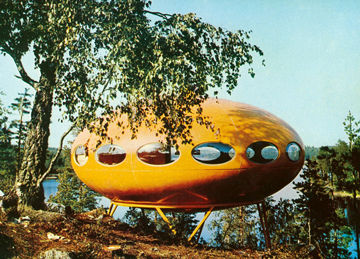 Futuro house UFO shape orange forest lake coast