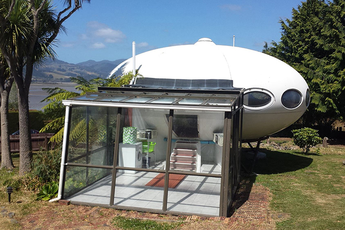 Futuro house for sale with additional module glass room