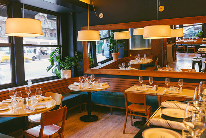 Italian restaurant New York City wooden interior soft light