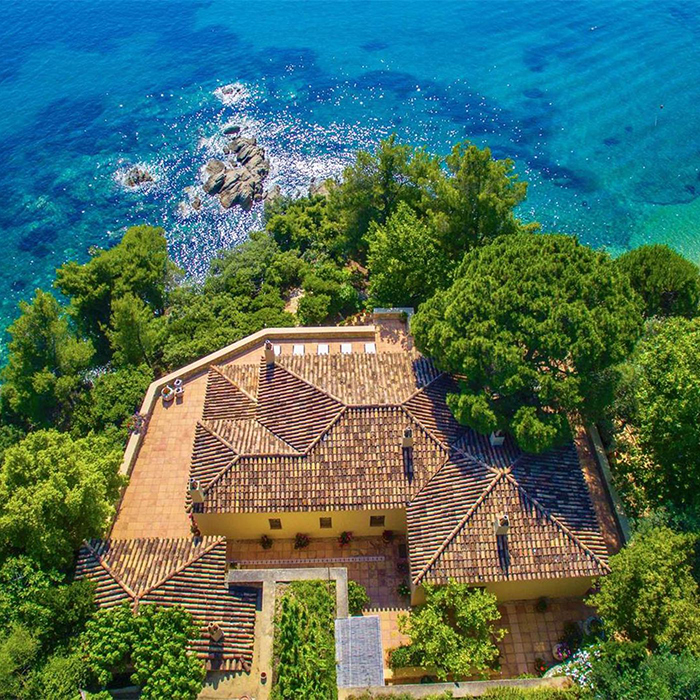 Island for sale in Greece beautiful building blue sea greenery