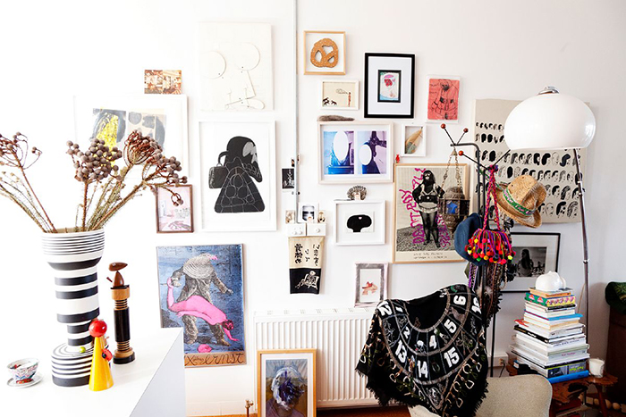 Photo wall ideas organized chaos colorful drawings photos boho style