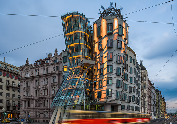 Modern Prague architecture dancing house at night tram 