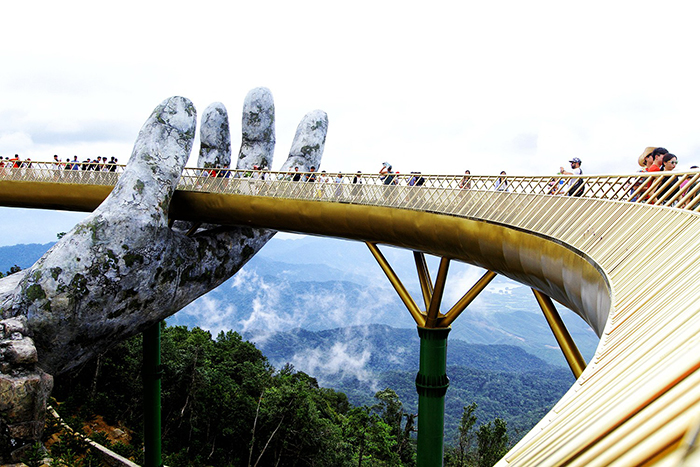 Golden Bridge Hand Close up Hills Mountain top Vietnam