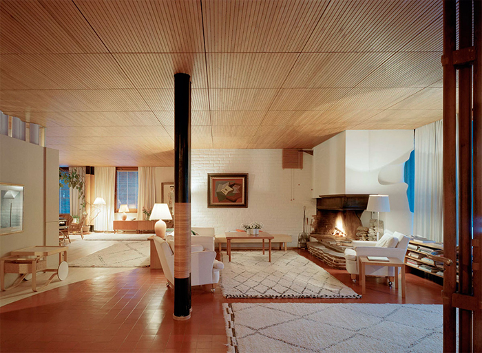 Mid Century Modern Home in Finland Interior fireplace cozy elegant 