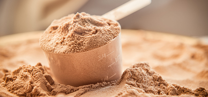 chocolate protein dust in a plastic cup