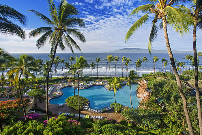 Top Hawaii Resorts outdoor pool palm trees beach ocean view