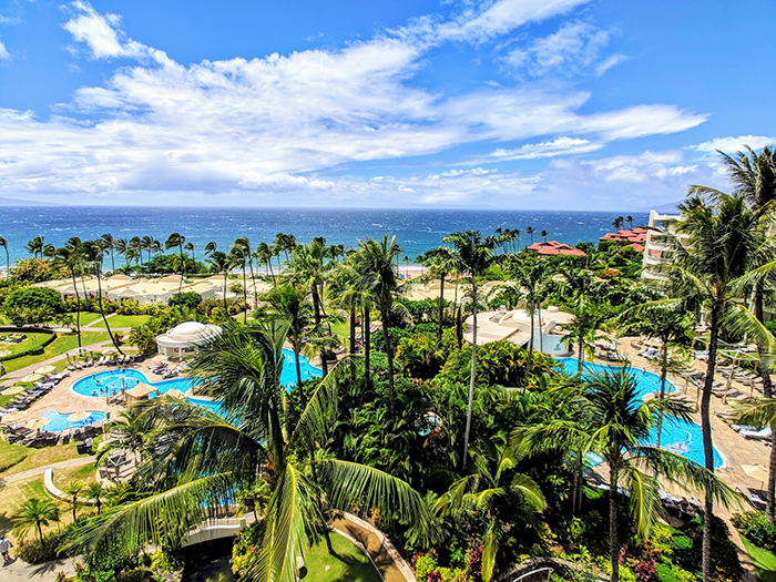 Top resorts hawaii Fairmont Kea Lani palm trees outdoor water park ocean view