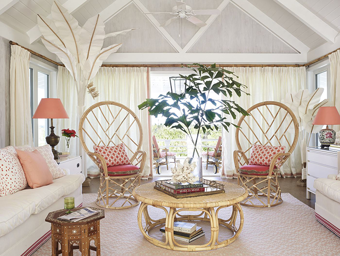 Pastel colored design summer house ideas rattan furniture chairs and a table white couch and tall green branches