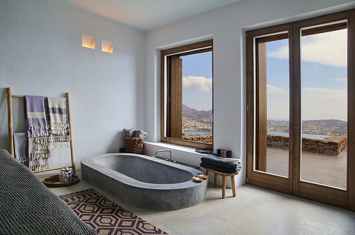 Rustic bathroom summer house bathroom with a view cement built-in bathtub 