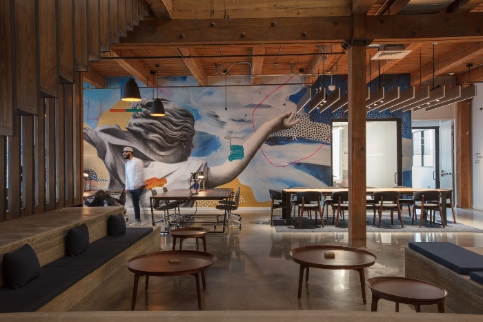 new orleans coworking space industrial design open space with wall paintings