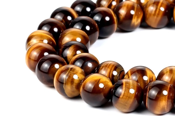 tiger eye stone bracelet close up on a white background