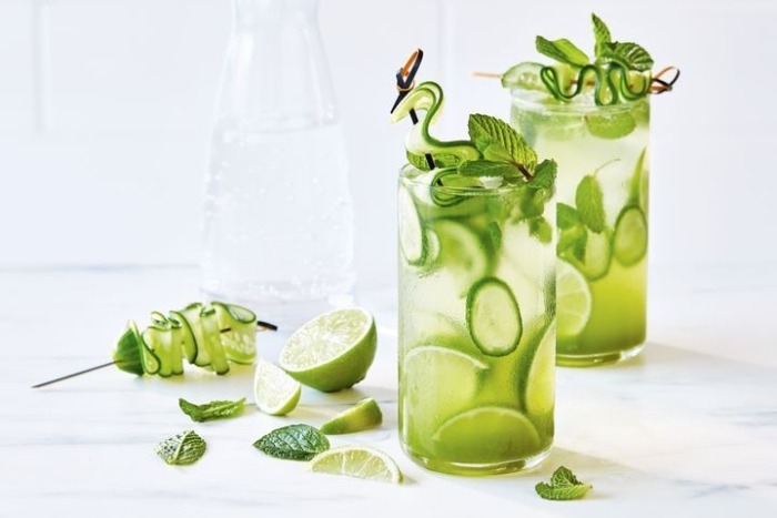 herbal mixology cucumber mint cocktail on a white background