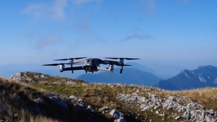 drone in flight in the mountains in a good weather 